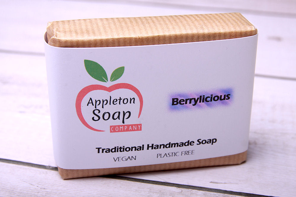 Berrylicious soap bar wrapped in brown paper with white banded label
