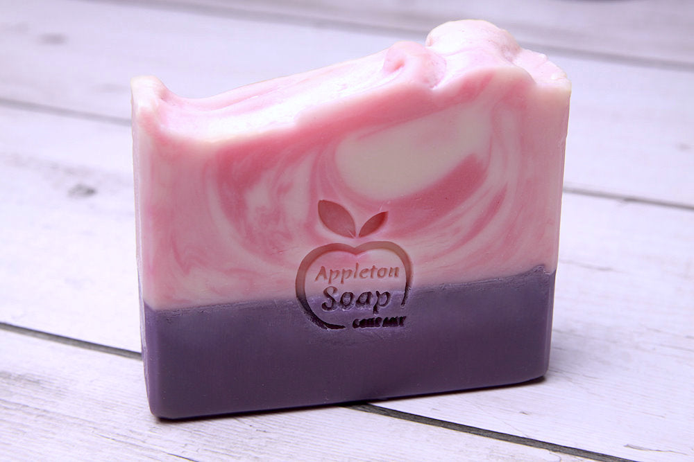 Black raspberry and vanilla soap bar with purple base and pink and cream swirl top