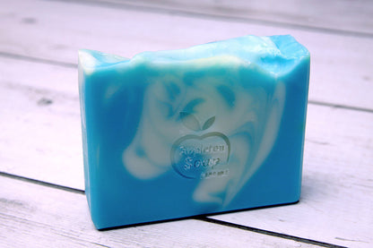 Fresh soap bar. Pale blue with cream swirls through the bar