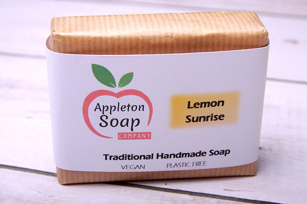 Lemon sunrise soapbar wrapped in brown paper with white banded label