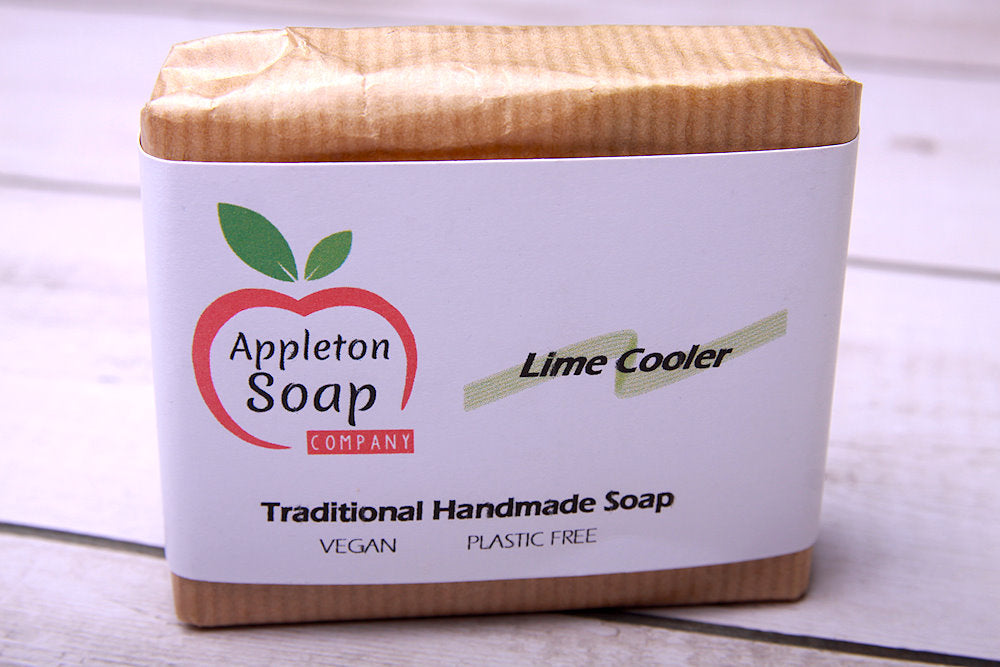 Lime cooler soap bar wrapped in brown paper with white banded label