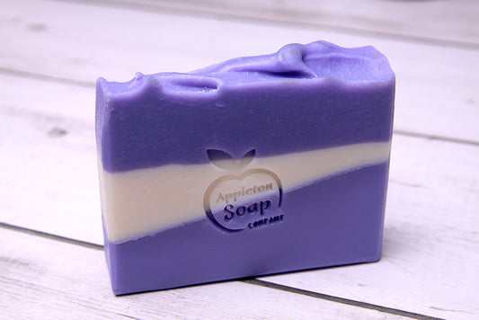 Violet soap bar coloured with violet base, a cream stripe and topped with violet