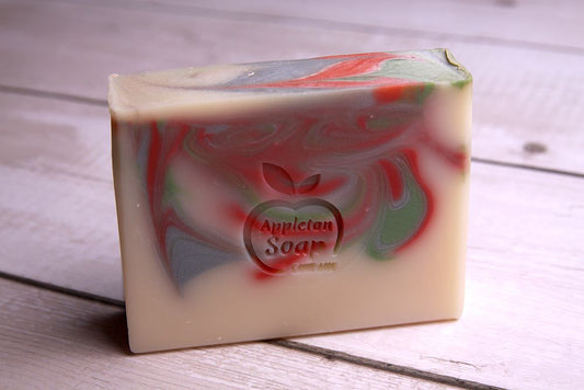 Winter berries soap bar with cream base and green, red and cream swirls